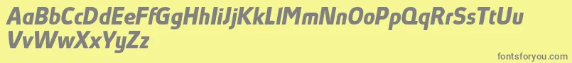 AbsolutProBoldItalicReduced Font – Gray Fonts on Yellow Background