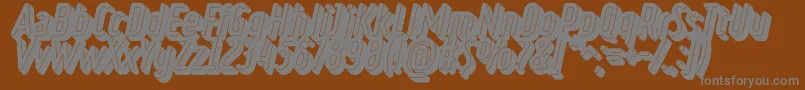 RulerVolumeBlack-fontti – harmaat kirjasimet ruskealla taustalla
