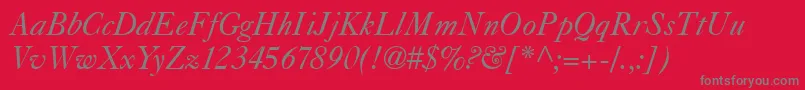 Caslon540Italic-fontti – harmaat kirjasimet punaisella taustalla
