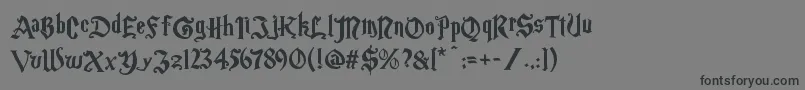 Magicschoolone-Schriftart – Schwarze Schriften auf grauem Hintergrund