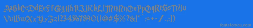 Magicschoolone-Schriftart – Graue Schriften auf blauem Hintergrund