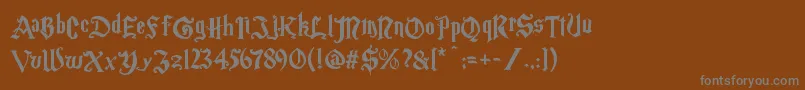フォントMagicschoolone – 茶色の背景に灰色の文字