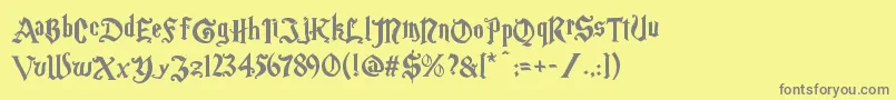 Magicschoolone-Schriftart – Graue Schriften auf gelbem Hintergrund