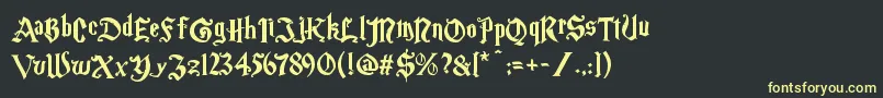 Magicschoolone Font – Yellow Fonts on Black Background