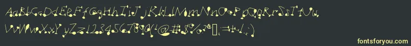 Dotsplot1 Font – Yellow Fonts on Black Background