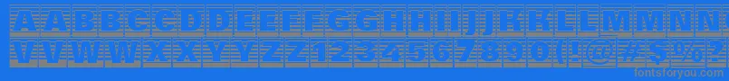 フォントAGroticttlcmgdstrhv – 青い背景に灰色の文字