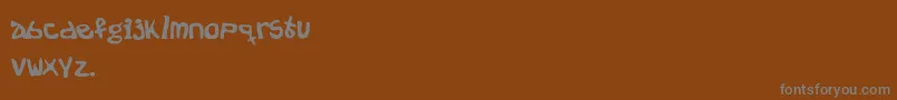 フォントNationOnDope – 茶色の背景に灰色の文字