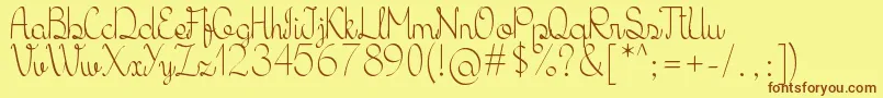 Шрифт KhErzaScript – коричневые шрифты на жёлтом фоне