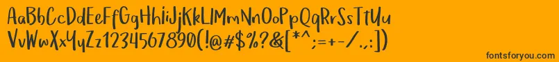 OmTeloletOm Font – Black Fonts on Orange Background