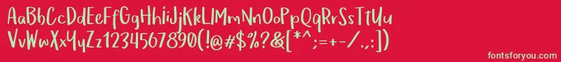 フォントOmTeloletOm – 赤い背景に緑の文字