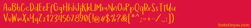 フォントOmTeloletOm – 赤い背景にオレンジの文字