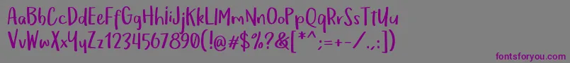 OmTeloletOm Font – Purple Fonts on Gray Background