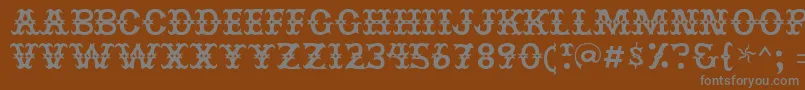 Jesterres-Schriftart – Graue Schriften auf braunem Hintergrund