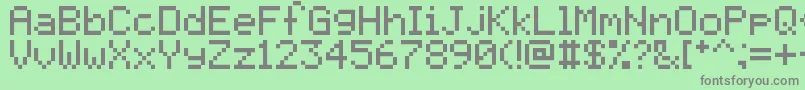 Pixelmix-fontti – harmaat kirjasimet vihreällä taustalla