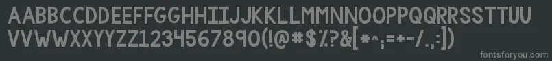 フォントKgonemorelight – 黒い背景に灰色の文字
