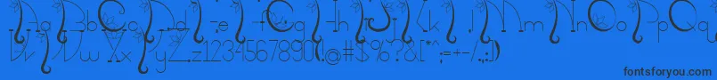 Kalopsiaupdatefinal-Schriftart – Schwarze Schriften auf blauem Hintergrund