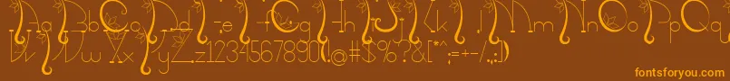 Kalopsiaupdatefinal-Schriftart – Orangefarbene Schriften auf braunem Hintergrund