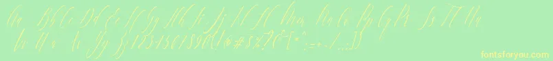 フォントCharlotteCalligraphySlantR1 – 黄色の文字が緑の背景にあります