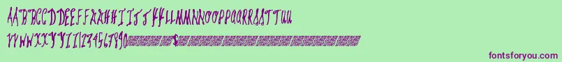 Giftcards Font – Purple Fonts on Green Background