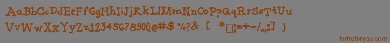 Joannemarkerserif Font – Brown Fonts on Gray Background