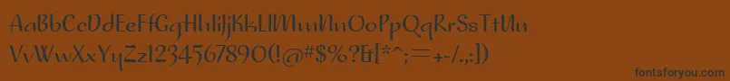 フォントNoraitcTt – 黒い文字が茶色の背景にあります