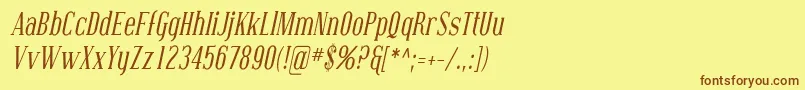 フォントCovingtonCondItalic – 茶色の文字が黄色の背景にあります。