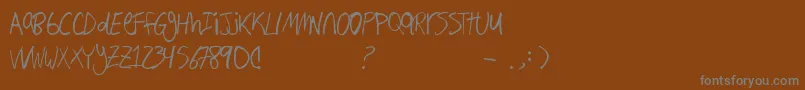Hand Writing Font – Gray Fonts on Brown Background
