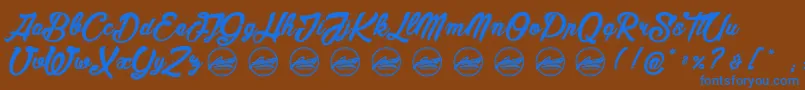 MaderaStudioPersonaluseonly Font – Blue Fonts on Brown Background