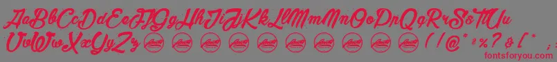 フォントMaderaStudioPersonaluseonly – 赤い文字の灰色の背景