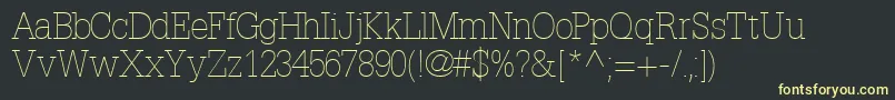 Fonte InstallationlightsskRegular – fontes amarelas em um fundo preto