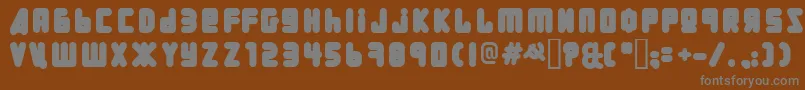 Uralphat-Schriftart – Graue Schriften auf braunem Hintergrund