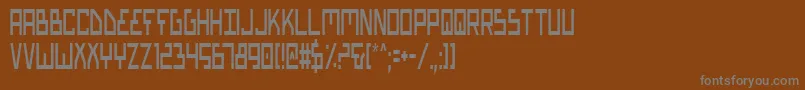 フォントBionicTypeCondensed – 茶色の背景に灰色の文字