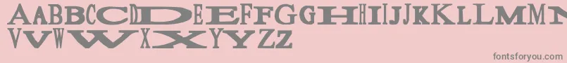 フォントSloopy – ピンクの背景に灰色の文字