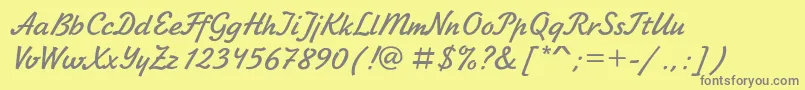 フォントZhikharevc – 黄色の背景に灰色の文字