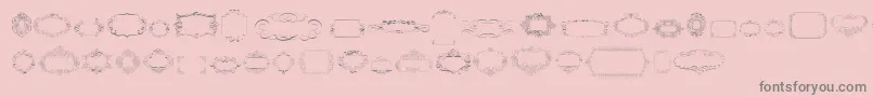 Czcionka CalligraphicFramesSoftTwo – szare czcionki na różowym tle