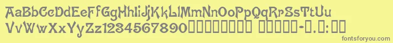 BrugesTM-Schriftart – Graue Schriften auf gelbem Hintergrund