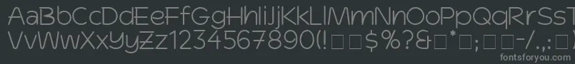 DinkoSsi-fontti – harmaat kirjasimet mustalla taustalla
