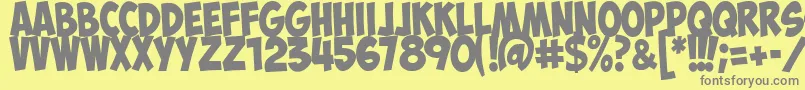 ObelixproitCyr-Schriftart – Graue Schriften auf gelbem Hintergrund