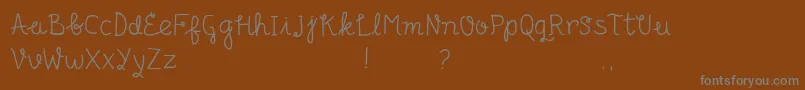 Шрифт Senyum – серые шрифты на коричневом фоне