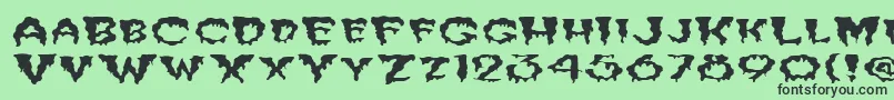 FzUnique10WaveyEx Font – Black Fonts on Green Background