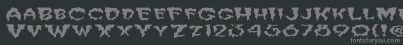 FzUnique10WaveyEx-fontti – harmaat kirjasimet mustalla taustalla