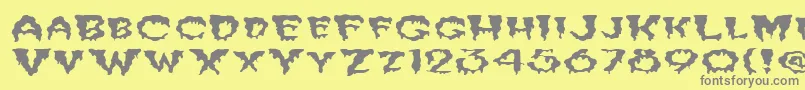 フォントFzUnique10WaveyEx – 黄色の背景に灰色の文字