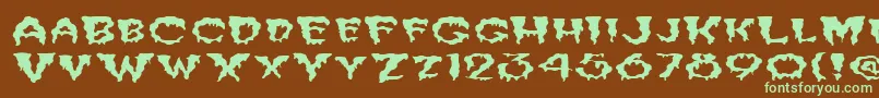 FzUnique10WaveyEx Font – Green Fonts on Brown Background