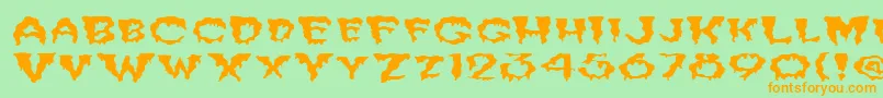 FzUnique10WaveyEx Font – Orange Fonts on Green Background