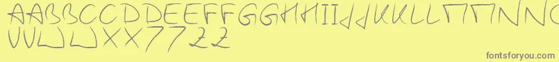 WoodieS Font – Gray Fonts on Yellow Background
