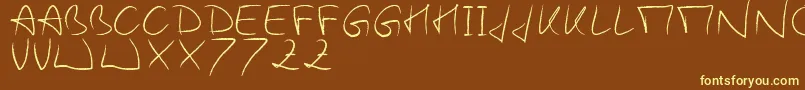WoodieS Font – Yellow Fonts on Brown Background