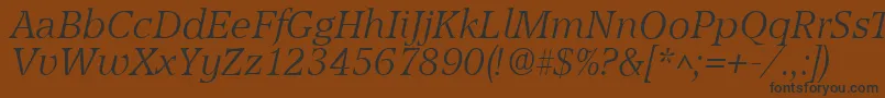 フォントAccoladelhItalic – 黒い文字が茶色の背景にあります