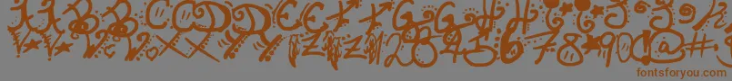 フォントInvisibleHorizons – 茶色の文字が灰色の背景にあります。