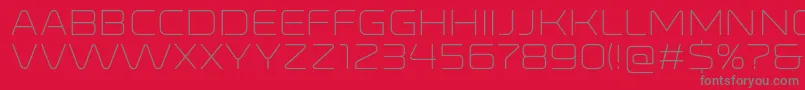 Czcionka RonduitcapitalsLight – szare czcionki na czerwonym tle