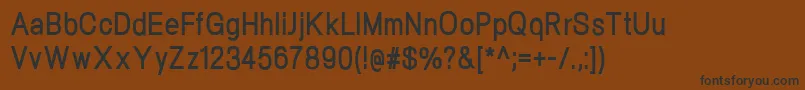フォントNeogramBoldcnd – 黒い文字が茶色の背景にあります
